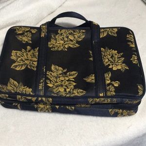 Celebrity travel bag and matching makeup bag. Navy blue with gold flowers